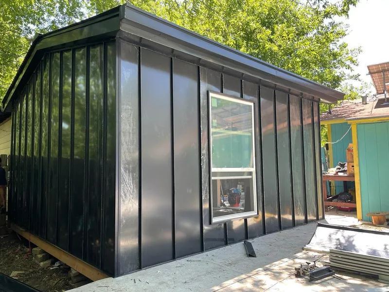 Black standing seam metal wall panels for Roof Inspection in Eastman