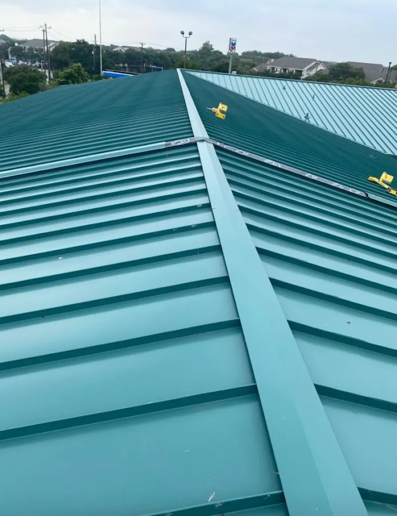 Green commercial metal roof ridge and valley for Metal Roof Repair in Eastman